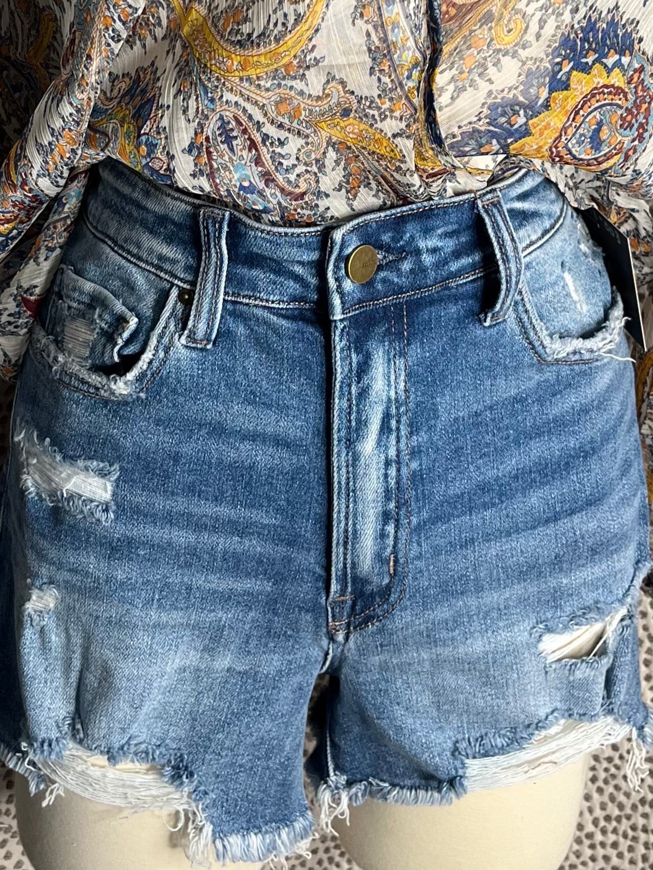 DISTRESSED DENIM SHORTS